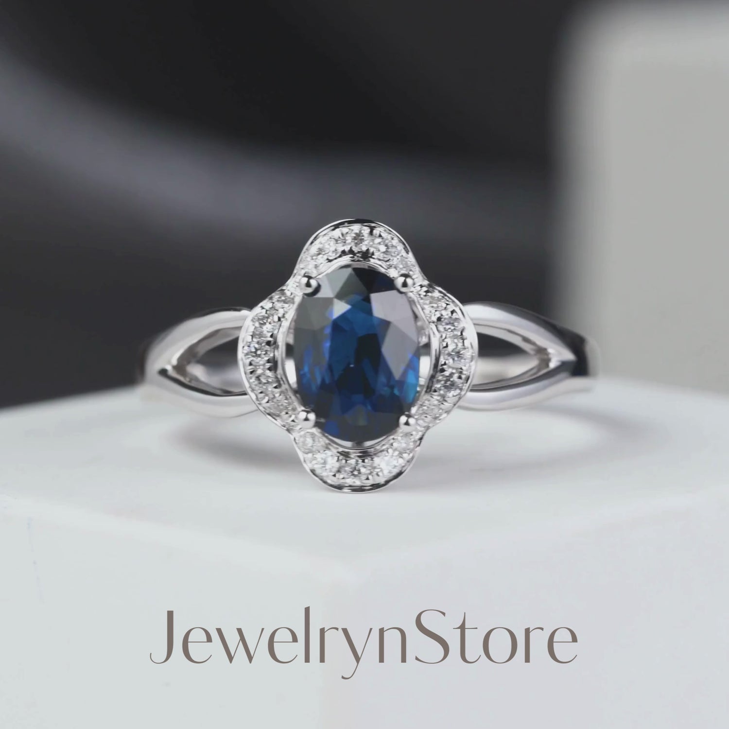 0.98ct.tw. Natural Blue Sapphire Ring with Clover Diamond frame